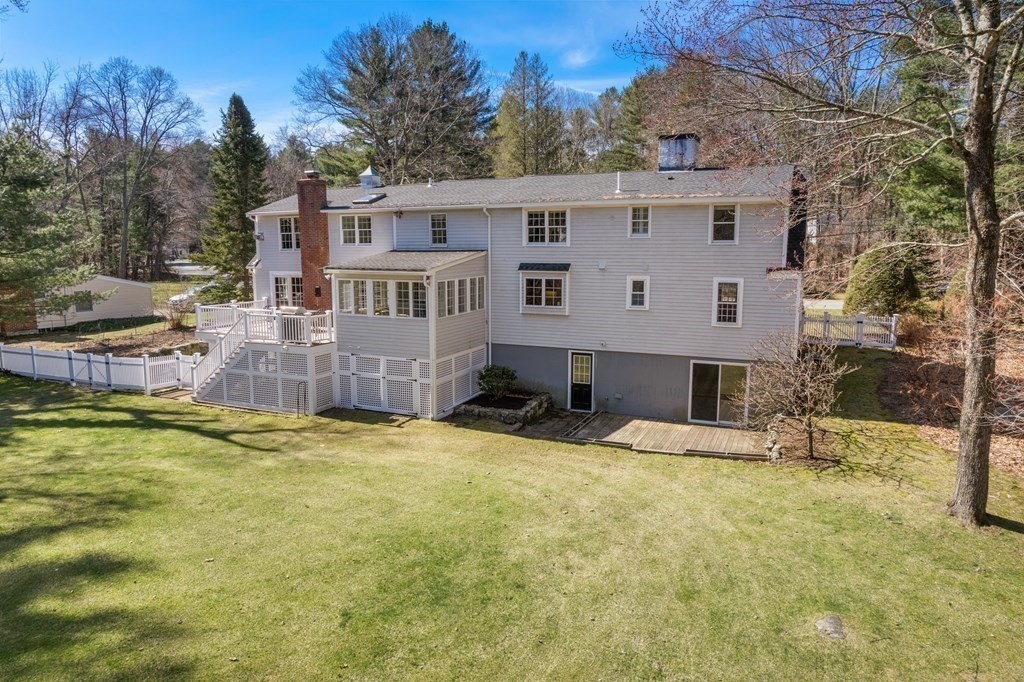 48 Brook Road Weston, MA 02493 - Photo 3 of 32 a view of a house with a yard