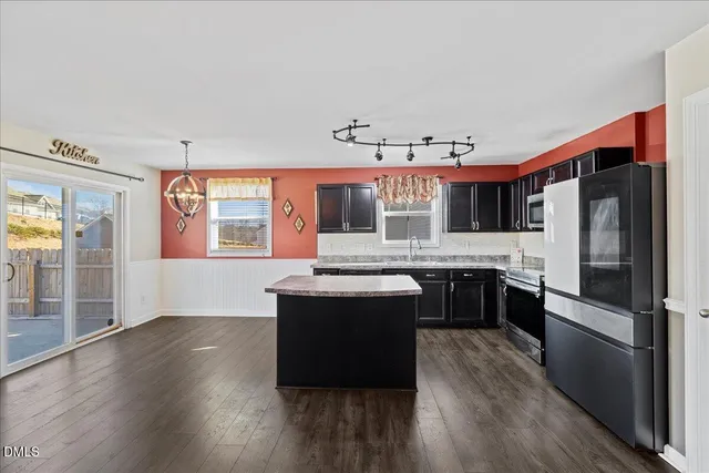 a backyard with table and chair