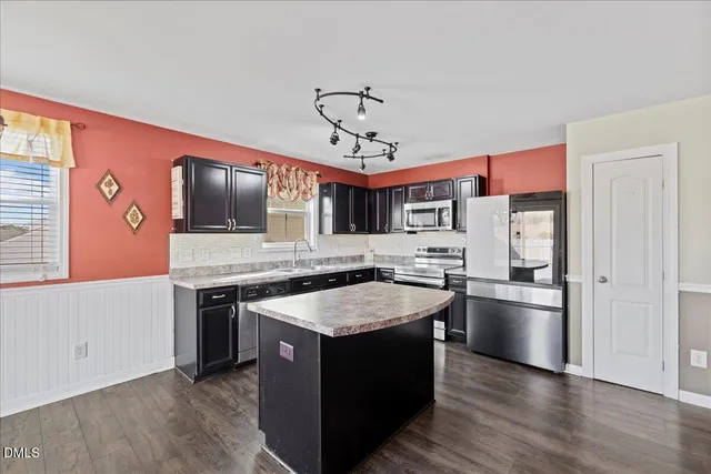 a view of a house with a large window