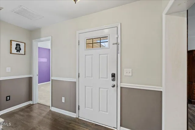 a view of a livingroom with wooden floor