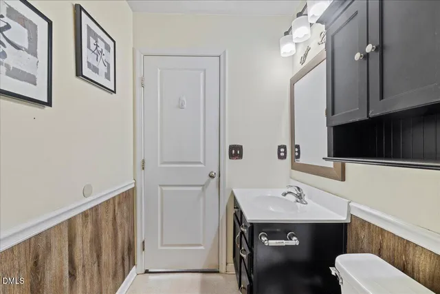 a kitchen with stainless steel appliances granite countertop a stove and a refrigerator