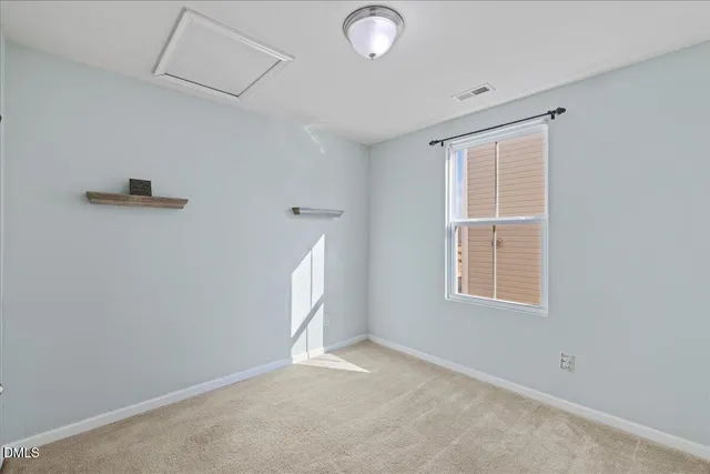 a kitchen with stainless steel appliances granite countertop a sink and wooden cabinets