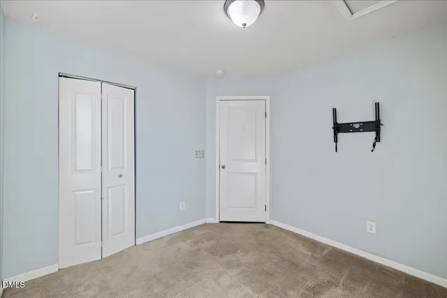a kitchen with granite countertop counter top space and wooden floor