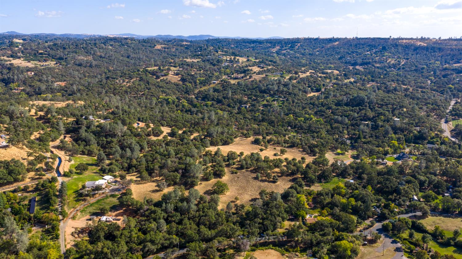 0 Chili Hill Road Newcastle, CA 95658 - Photo 27 of 27 an aerial view of house with yard and mountain view in back