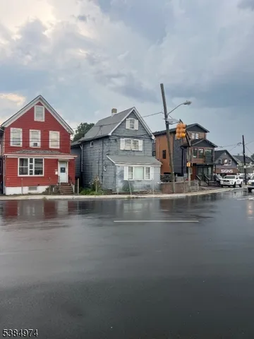 a front view of a house with a ocean view