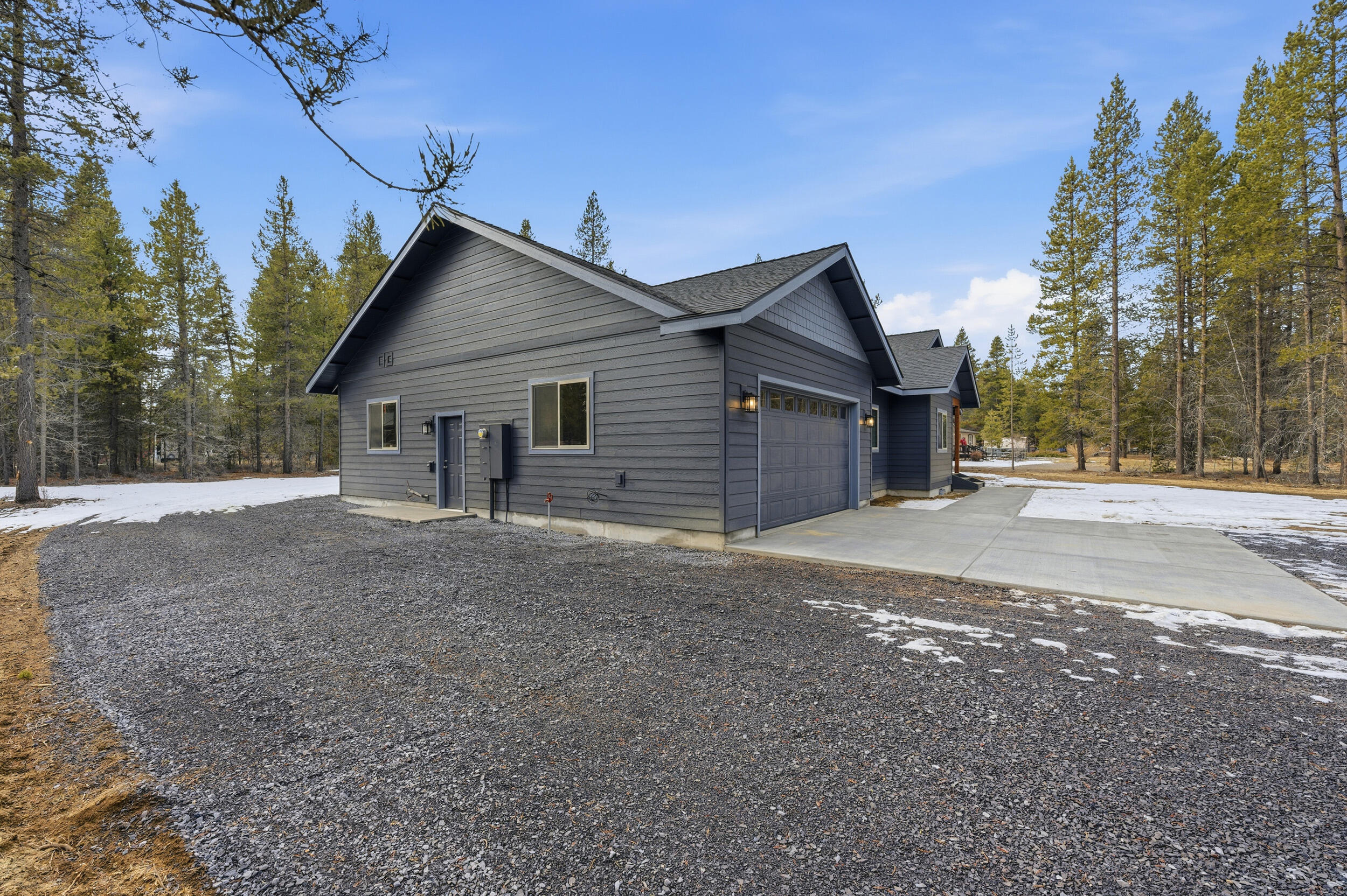 16083 Dyke Road, Unit 9 La Pine, OR 97739 - Photo 46 of 53 a view of a house with a yard