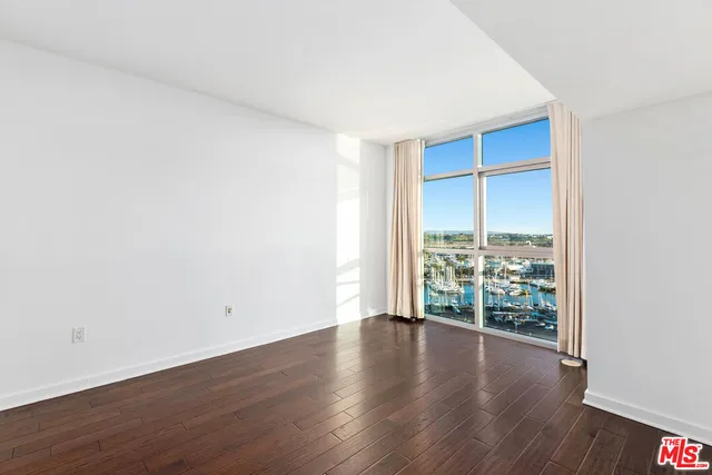a spacious bathroom with a granite countertop tub sink and mirror
