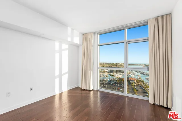 a view of a hall with chairs