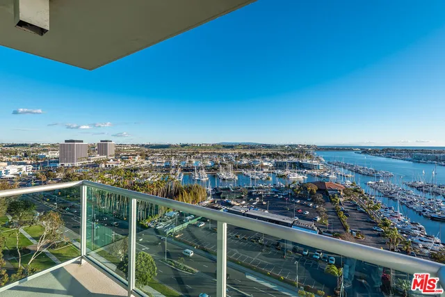 a room with furniture a flat screen tv and a faucet