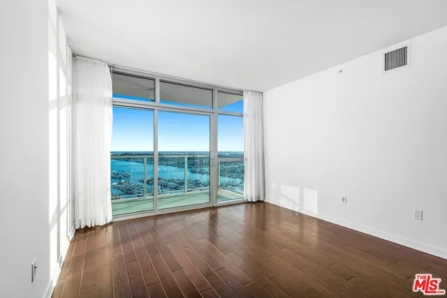 a view of a city from a lake view