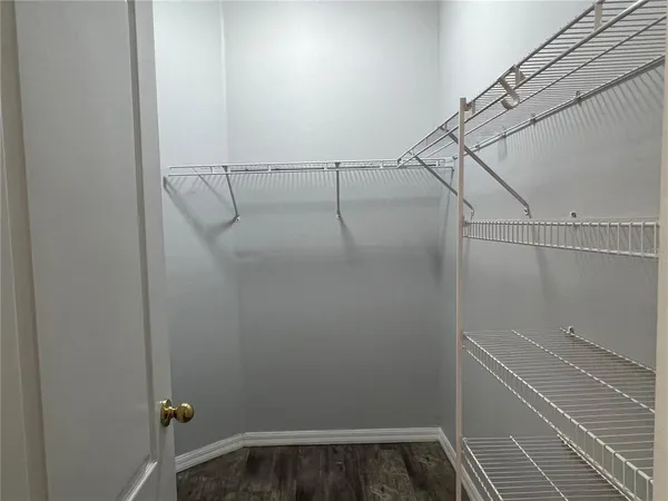 a view of small space with racks on the wall