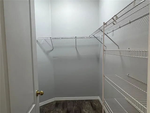 a view of small space with racks on the wall