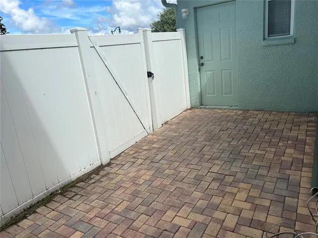 a view of a room with white walls