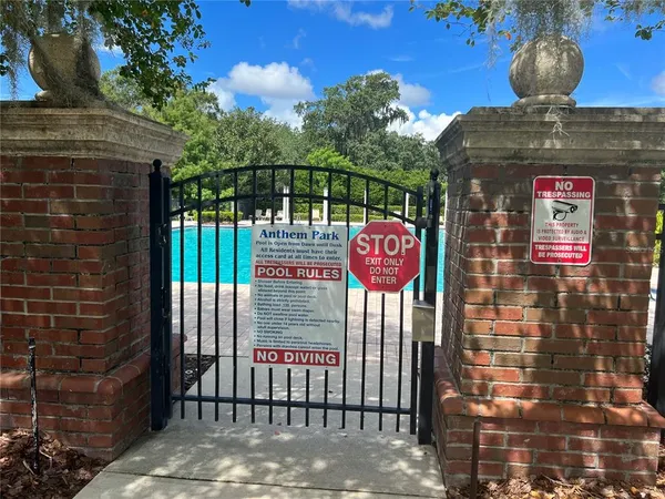 a street sign on a brick wall