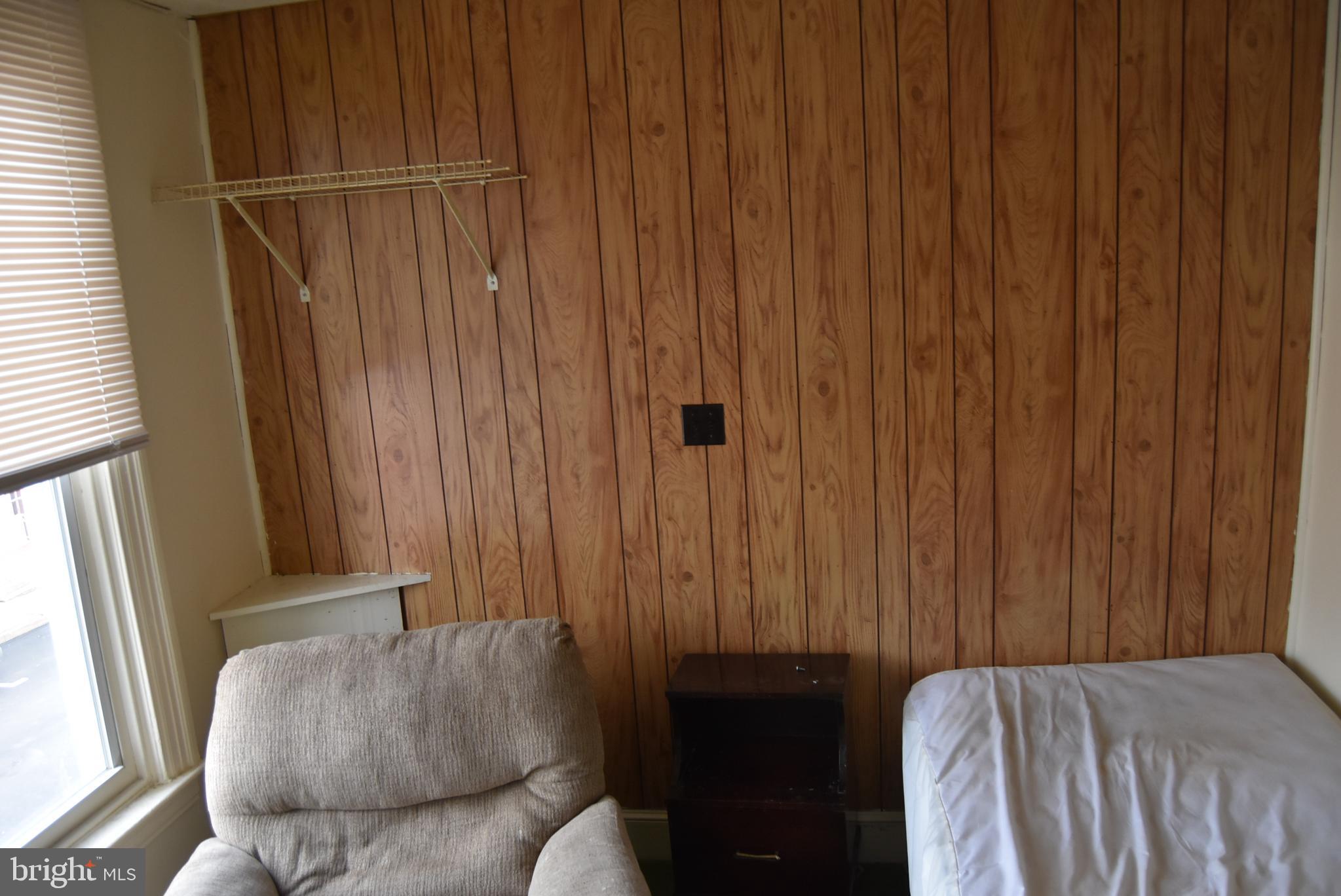 1241 North George Street York, PA 17404 - Photo 2 of 7 a living room with furniture and a window