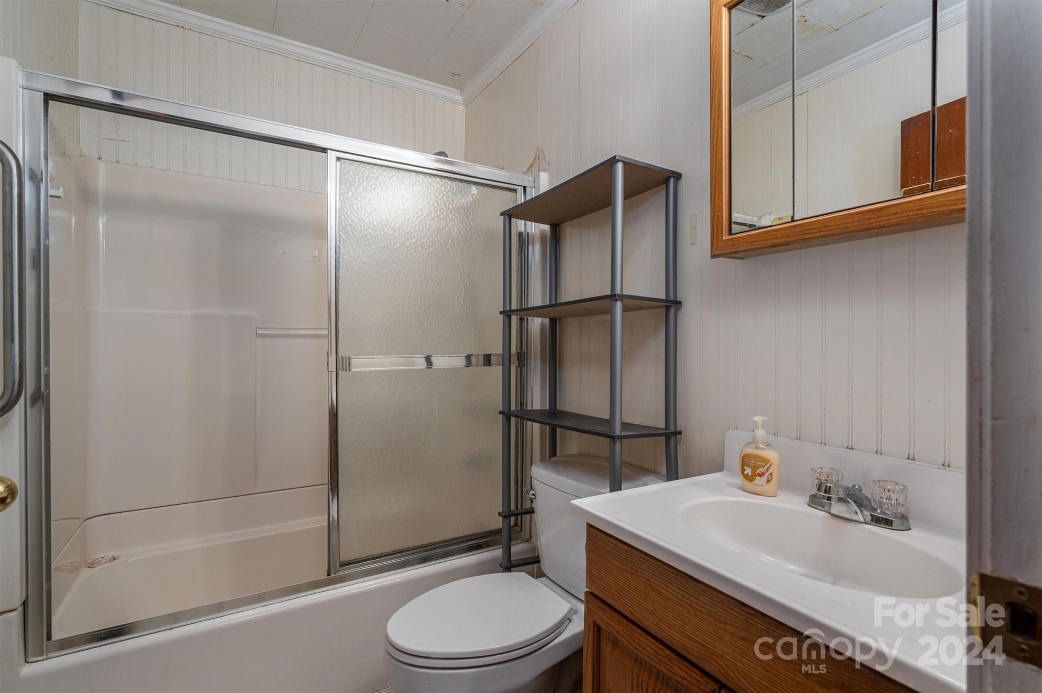 2729 Springbrook Circle Gastonia, NC 28052 - Photo 11 of 34 a bathroom with a sink toilet and shower