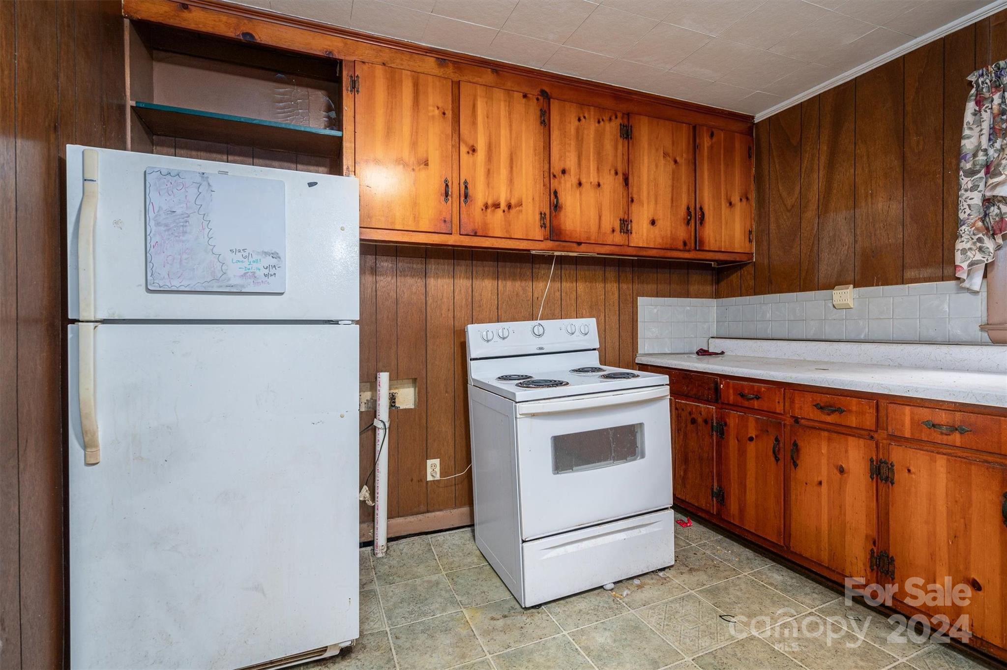 2729 Springbrook Circle Gastonia, NC 28052 - Photo 15 of 34 a kitchen with stainless steel appliances granite countertop a refrigerator a stove a sink and dishwasher