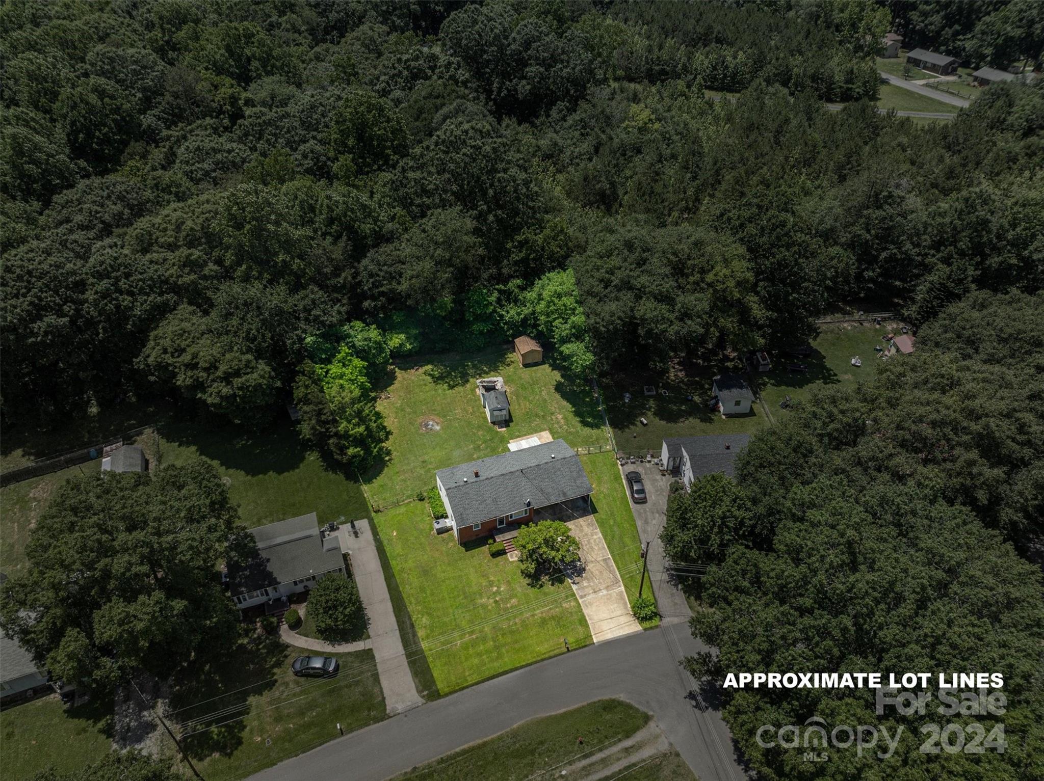 2729 Springbrook Circle Gastonia, NC 28052 - Photo 23 of 34 an aerial view of a house with a yard