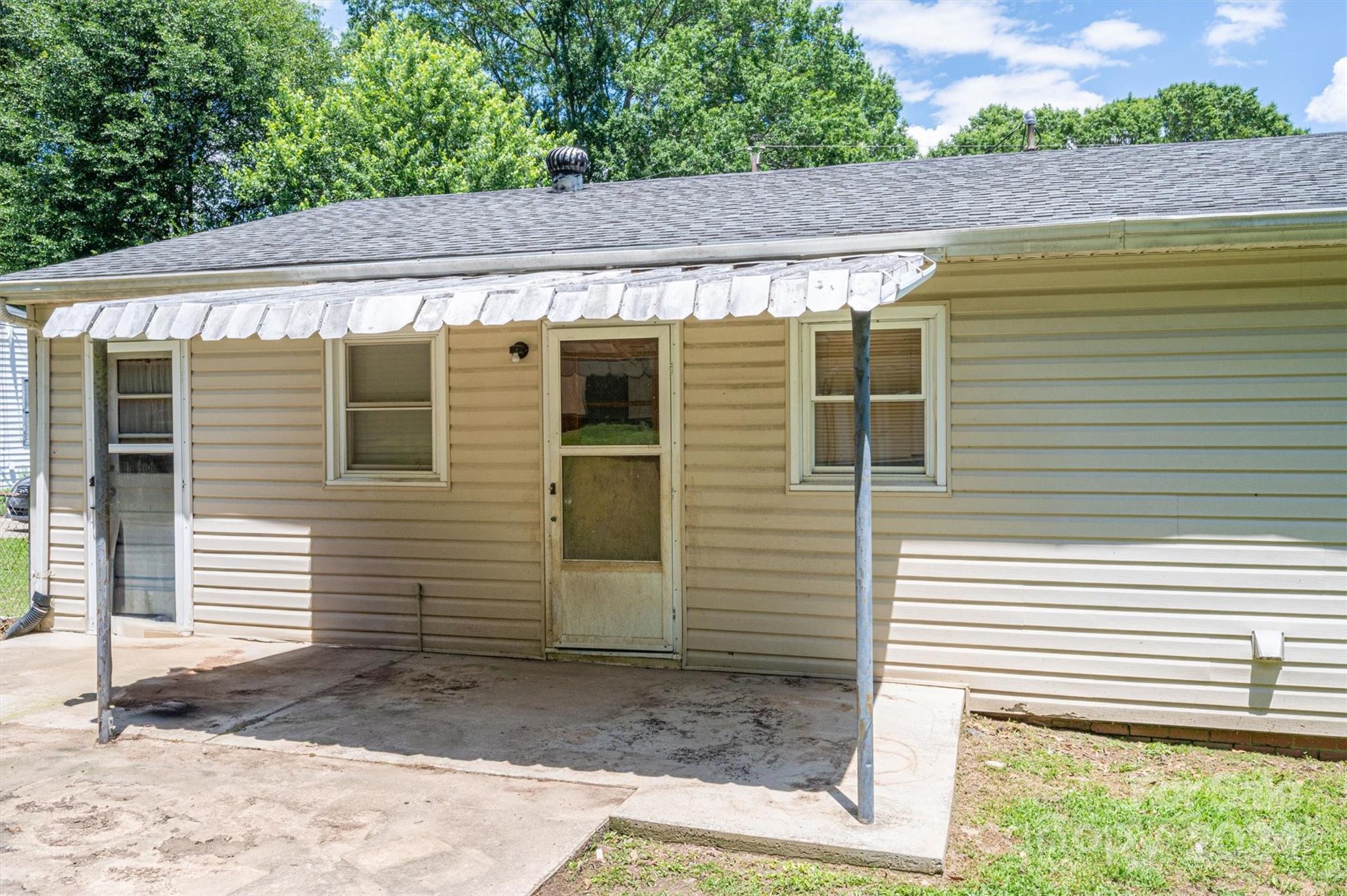2729 Springbrook Circle Gastonia, NC 28052 - Photo 25 of 34 a view of a white house with a door