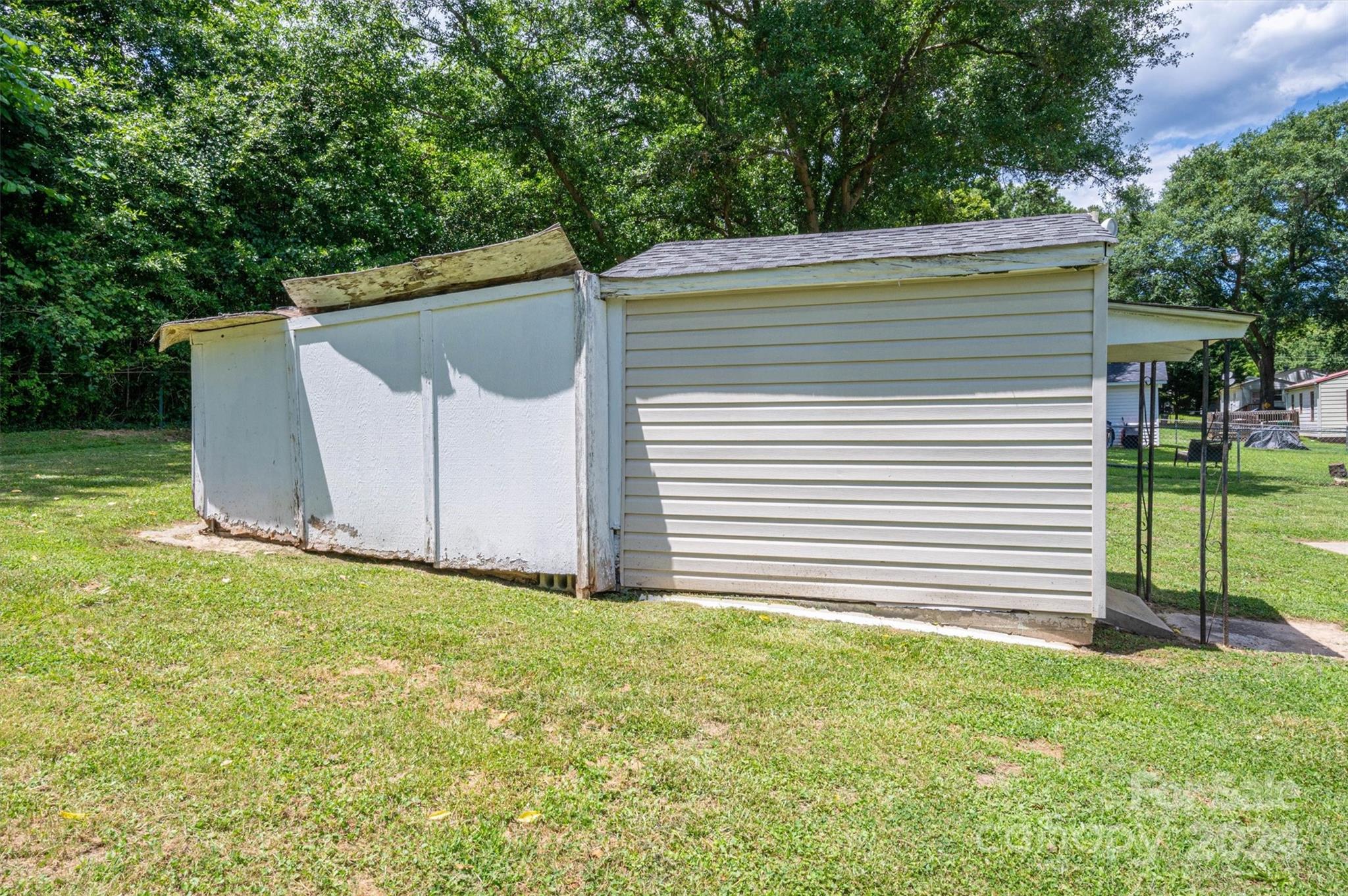 2729 Springbrook Circle Gastonia, NC 28052 - Photo 27 of 34 a backyard of a house with lots of green space