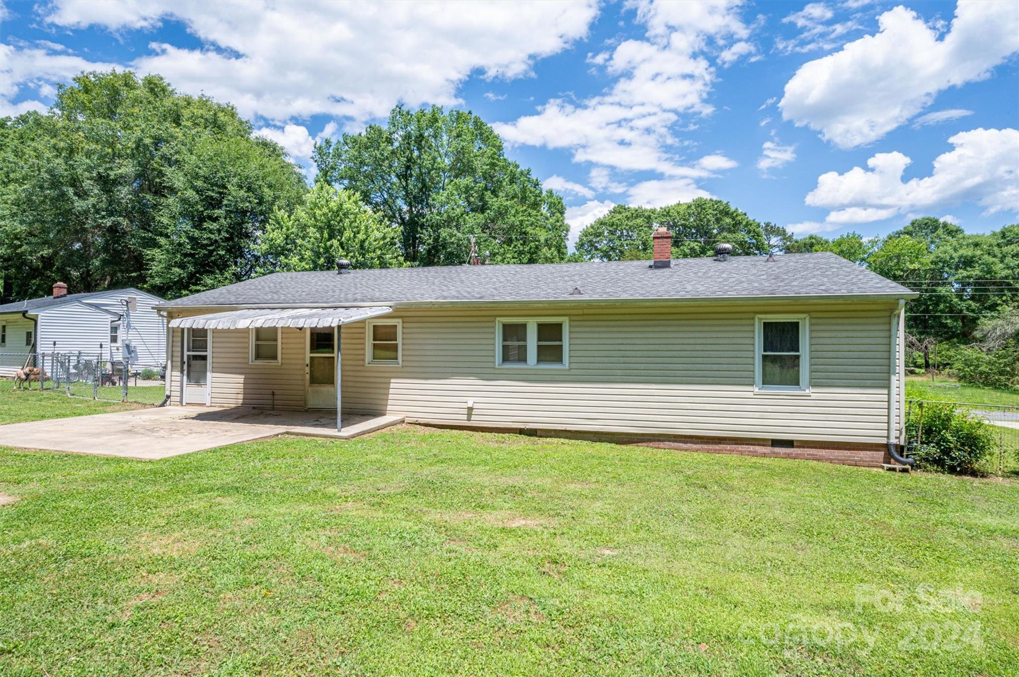 2729 Springbrook Circle Gastonia, NC 28052 - Photo 32 of 34 a front view of house with yard and trees