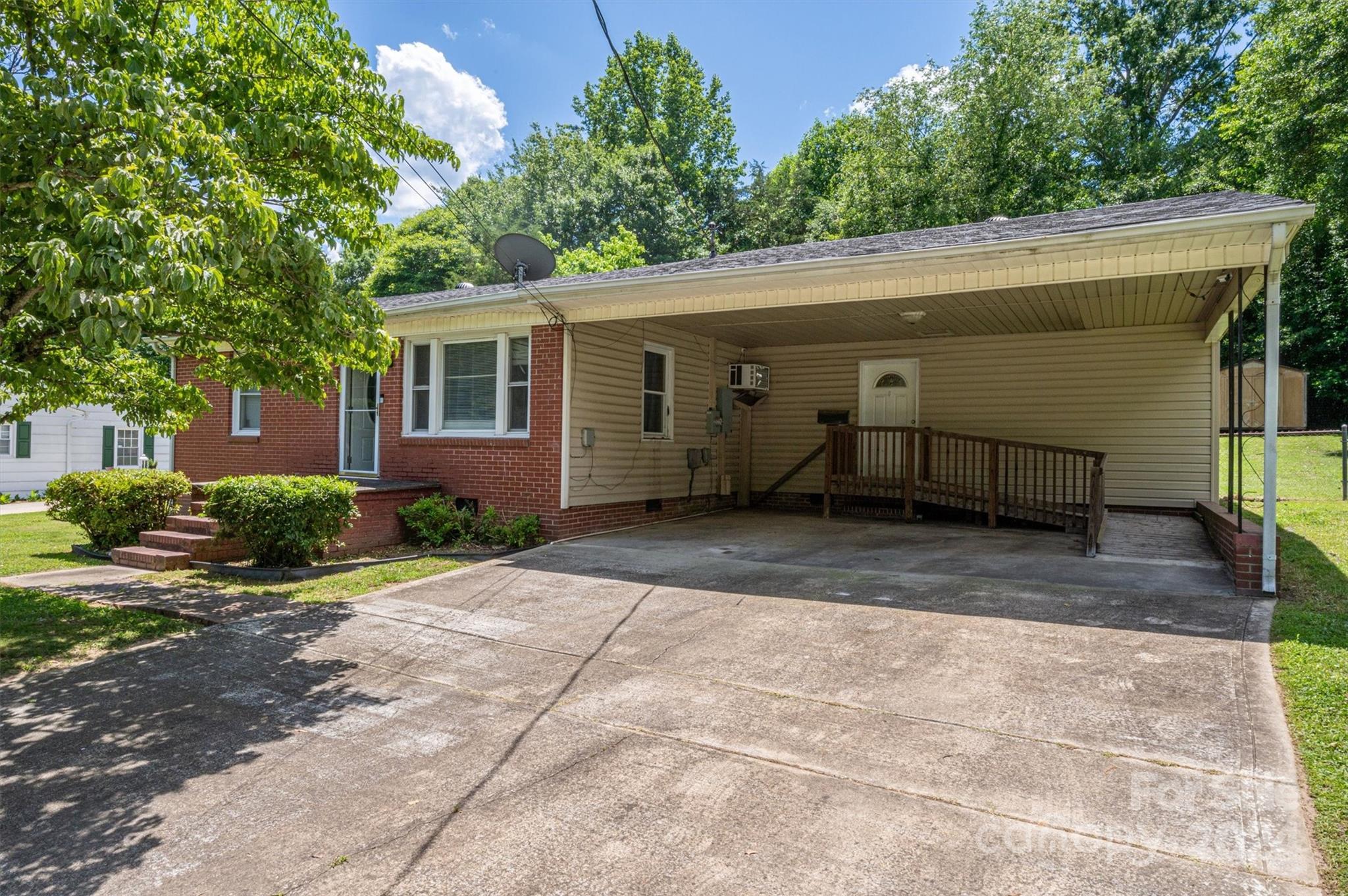 2729 Springbrook Circle Gastonia, NC 28052 - Photo 5 of 34 a view of a house with a yard