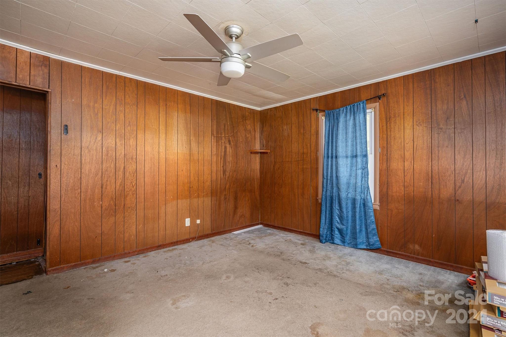 2729 Springbrook Circle Gastonia, NC 28052 - Photo 7 of 34 an empty room with fan and windows