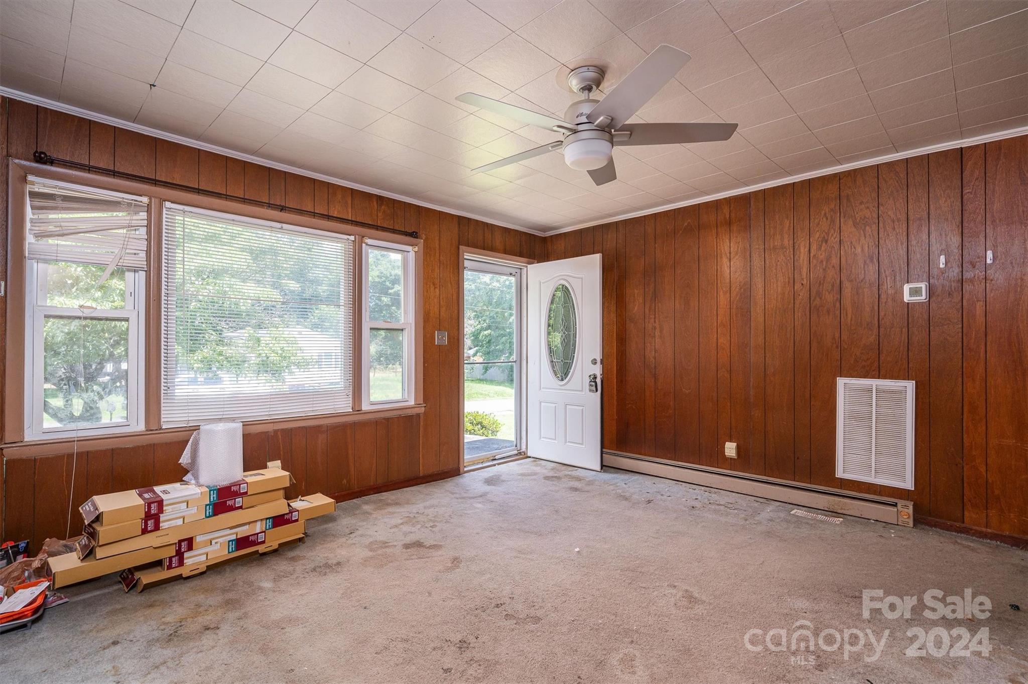 2729 Springbrook Circle Gastonia, NC 28052 - Photo 8 of 34 a furnished livingroom with a window and a ceiling fan