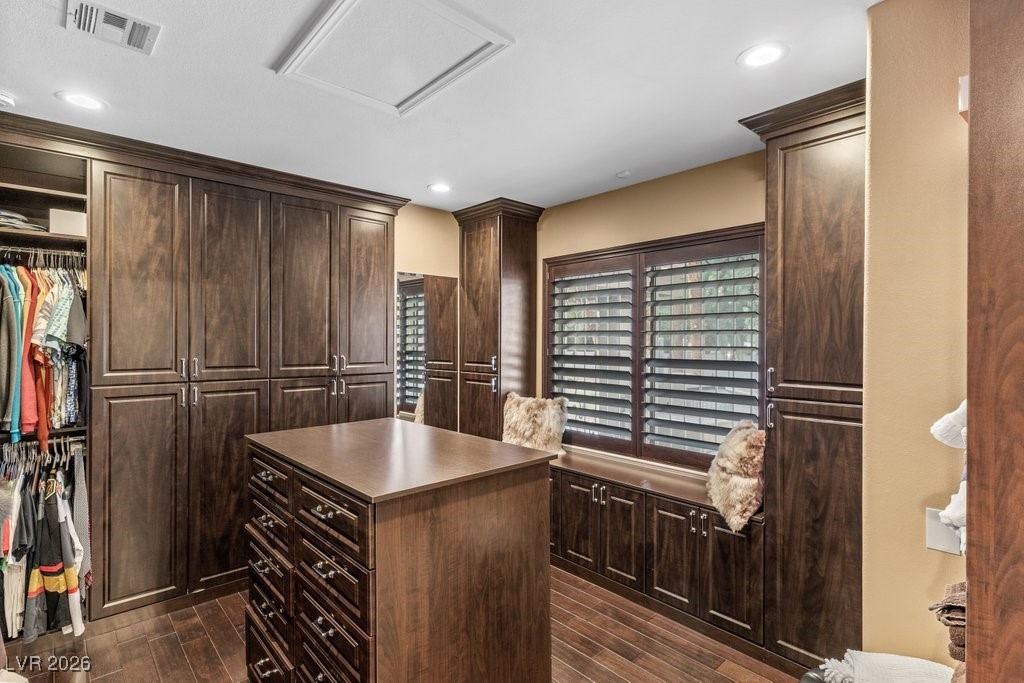 7 Larkside Court Henderson, NV 89014 - Photo 33 of 70 Walk in closet with dark wood-type flooring