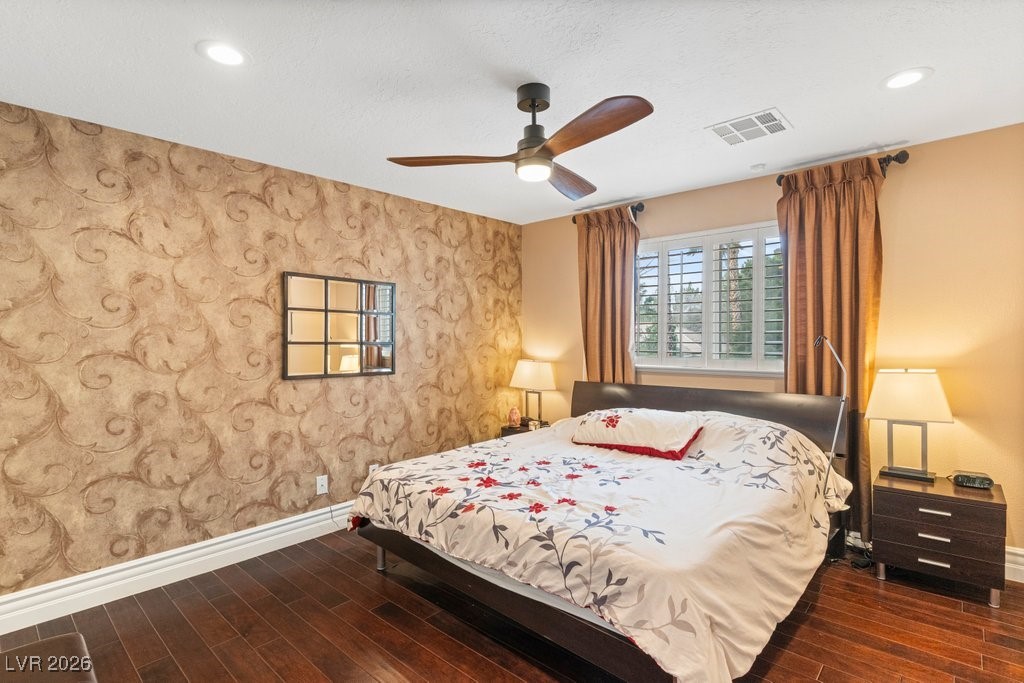 7 Larkside Court Henderson, NV 89014 - Photo 40 of 70 Bedroom with dark wood-type flooring, a ceiling fan, and recessed lighting