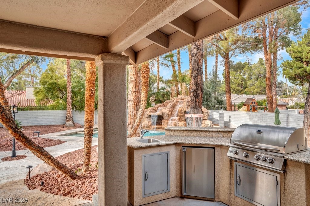 7 Larkside Court Henderson, NV 89014 - Photo 60 of 70 Fenced backyard featuring area for grilling and a patio area