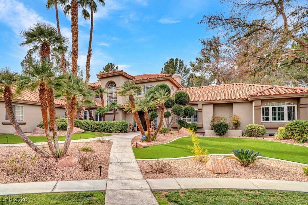 7 Larkside Court Henderson, NV 89014 - Photo 63 of 70 Mediterranean / spanish house featuring stucco siding and a front yard