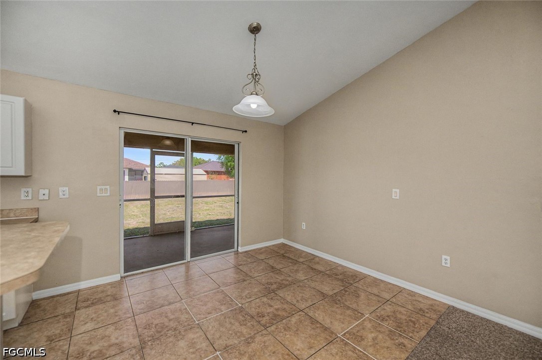 4104 13th Street Southwest Lehigh Acres, FL 33976 - Photo 11 of 46 a view of an empty room with a window