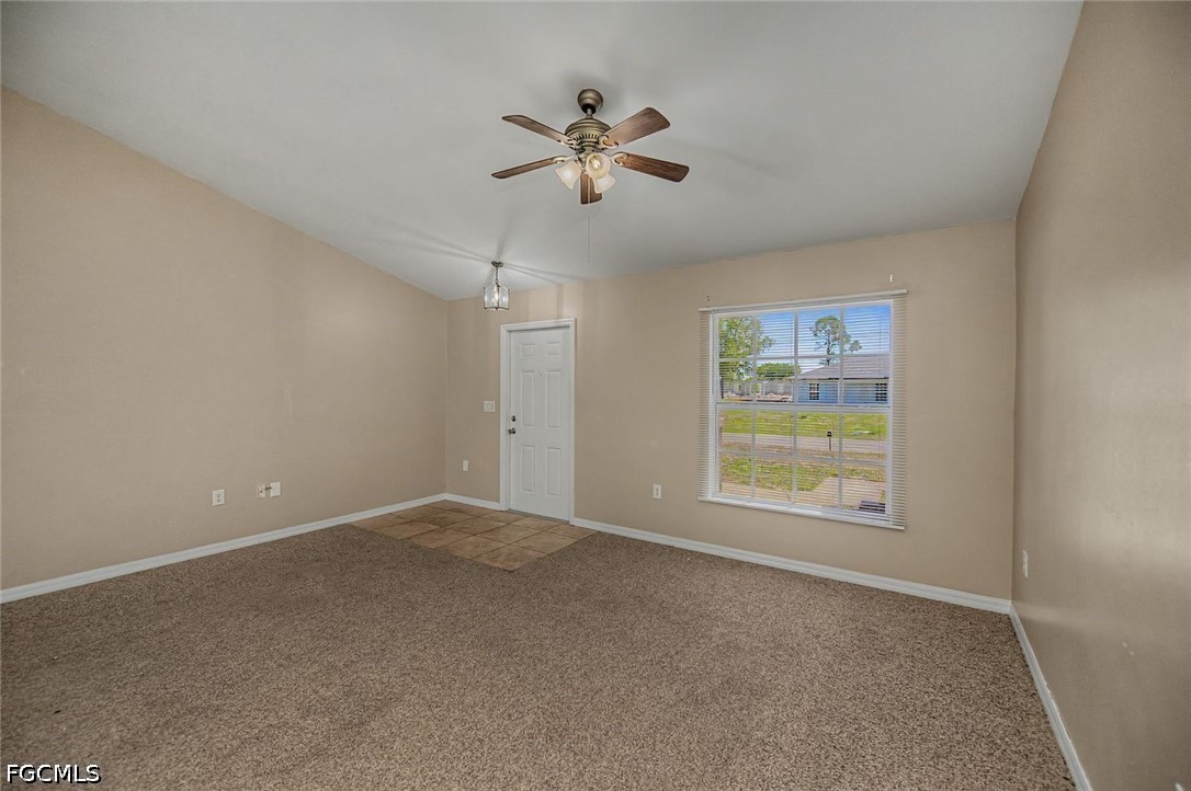 4104 13th Street Southwest Lehigh Acres, FL 33976 - Photo 13 of 46 a view of an empty room with a window