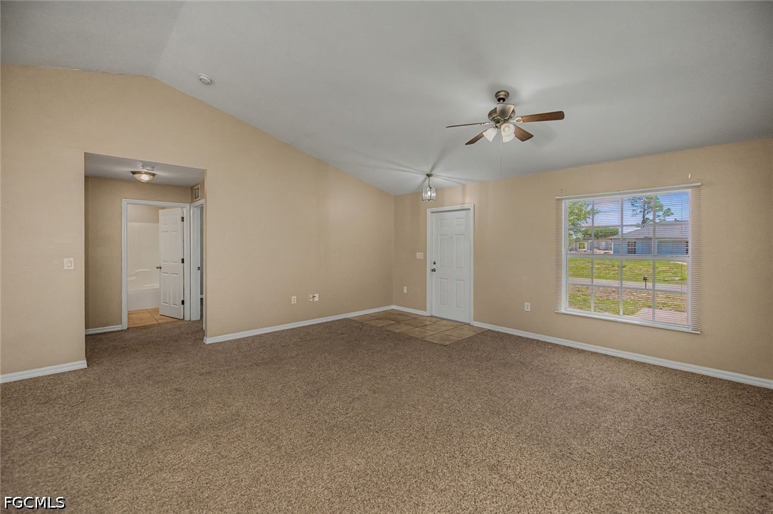 4104 13th Street Southwest Lehigh Acres, FL 33976 - Photo 17 of 46 a view of an empty room with a window