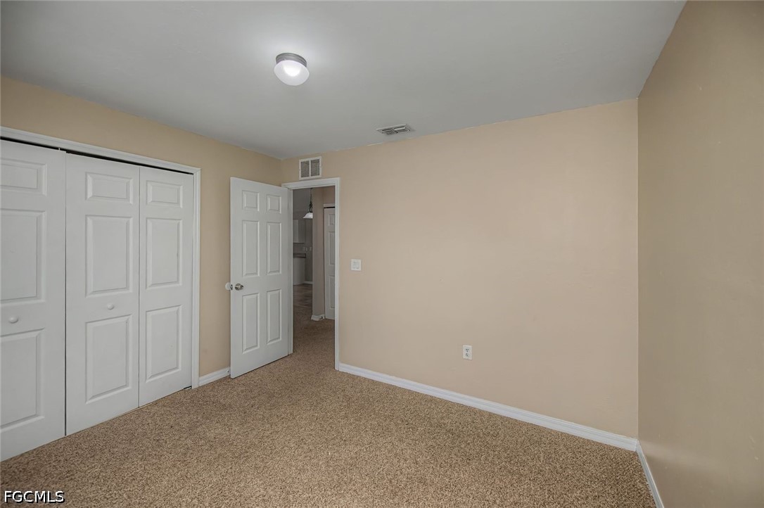 4104 13th Street Southwest Lehigh Acres, FL 33976 - Photo 28 of 46 a view of an empty room