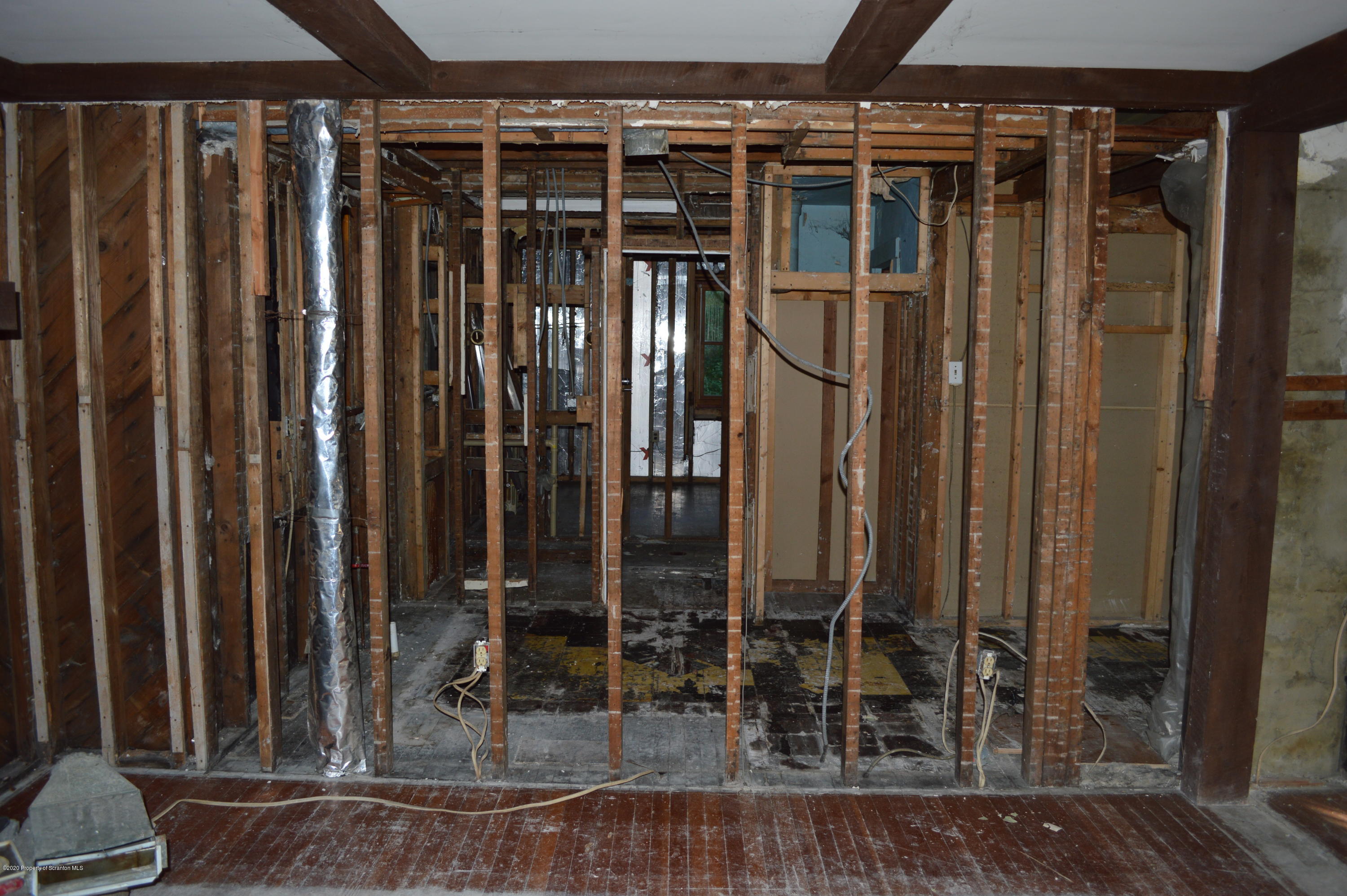641 Becks Crossing Road Moscow, PA 18444 - Photo 7 of 28 a view of wooden door with chairs