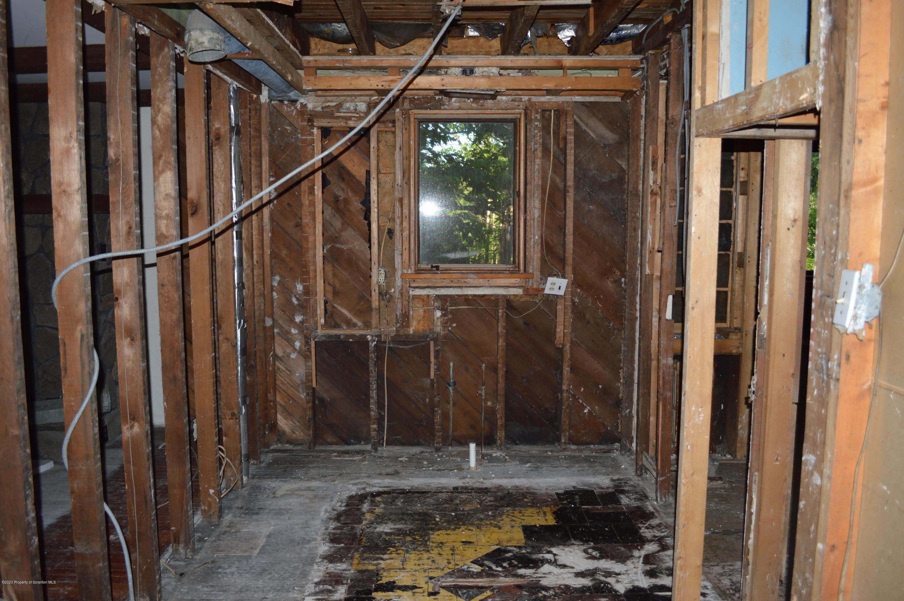 641 Becks Crossing Road Moscow, PA 18444 - Photo 8 of 28 a view of a house with a door