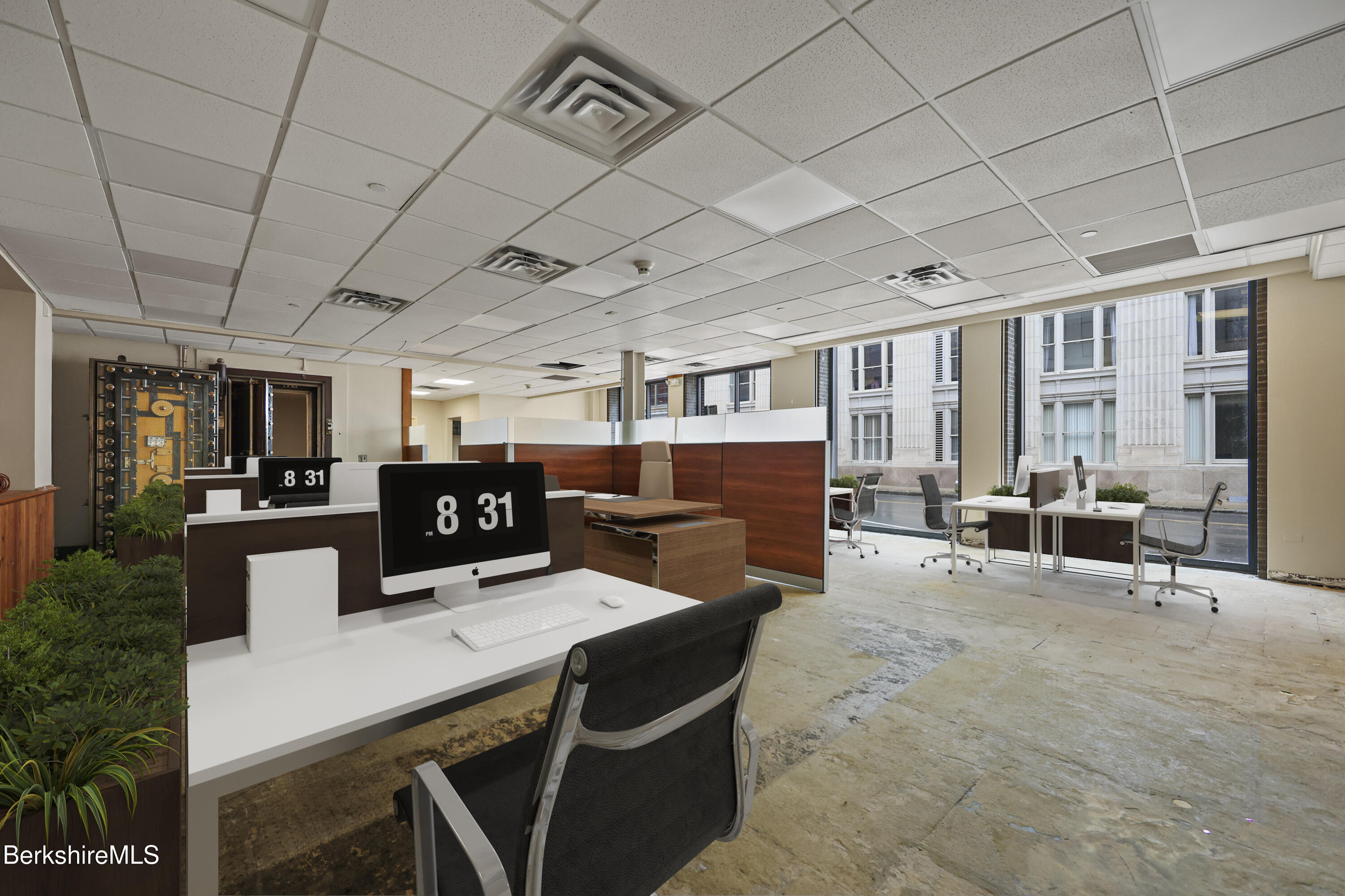 a view of a room with furniture and a projector