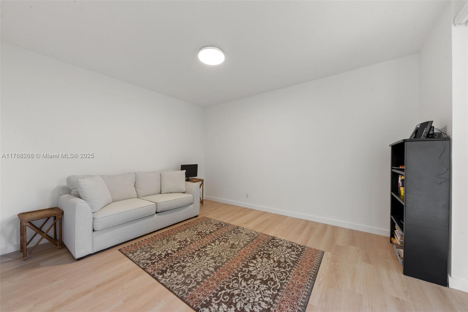 7658 Elm Ridge Drive, Unit 17U Boca Raton, FL 33433 - Photo 16 of 39 SECOND BEDROOM USED AS A SITTING AREA/DEN