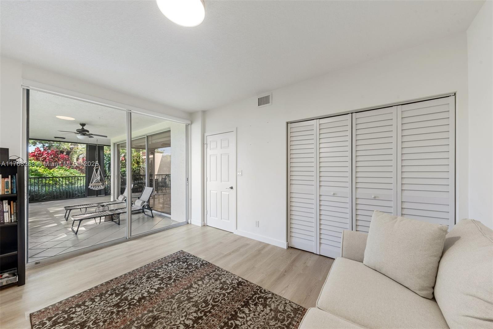 7658 Elm Ridge Drive, Unit 17U Boca Raton, FL 33433 - Photo 18 of 39 CLOSET, WONDERFUL FLOORING, LOOKING AT GARDEN AREA