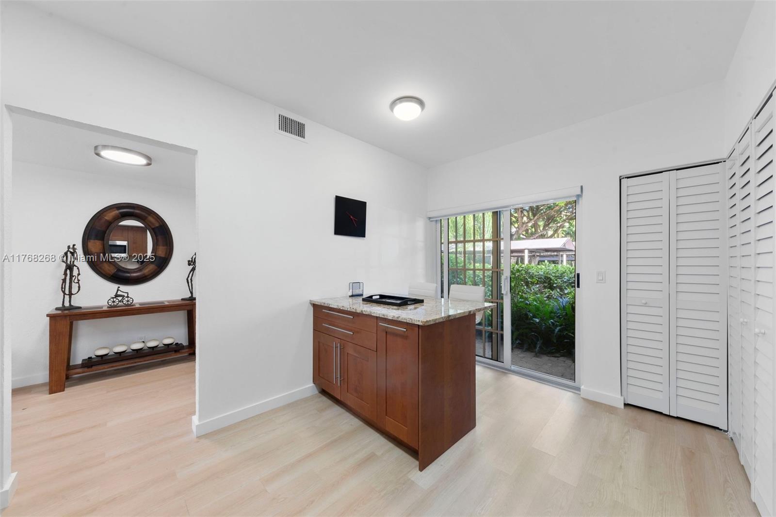 7658 Elm Ridge Drive, Unit 17U Boca Raton, FL 33433 - Photo 22 of 39 KITCHEN ISLAND