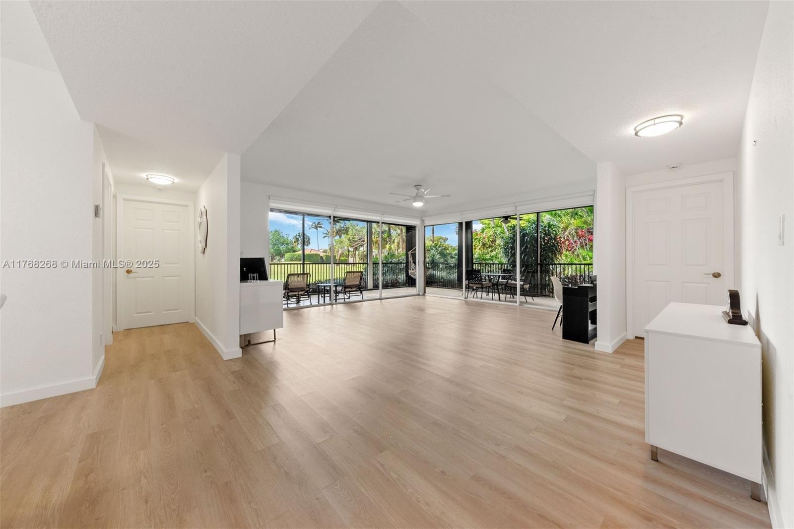 7658 Elm Ridge Drive, Unit 17U Boca Raton, FL 33433 - Photo 10 of 39 VIEW FROM FOYER INTO LIVING ROOM