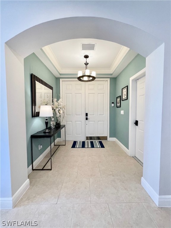 10816 Marble Brook Boulevard Lehigh Acres, FL 33936 - Photo 2 of 41 a living room with table