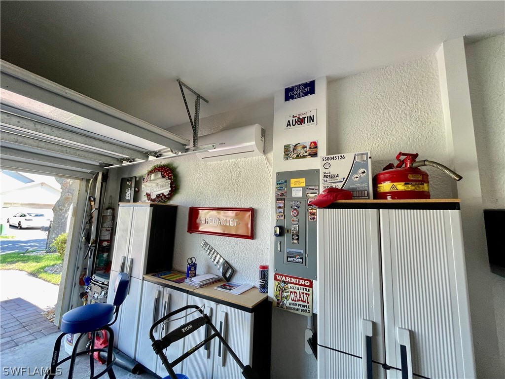 10816 Marble Brook Boulevard Lehigh Acres, FL 33936 - Photo 36 of 41 a view of a dining room with furniture and a window