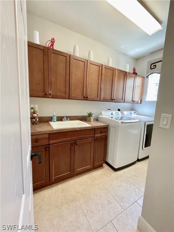 10816 Marble Brook Boulevard Lehigh Acres, FL 33936 - Photo 37 of 41 a kitchen with stainless steel appliances granite countertop a stove a sink and a refrigerator