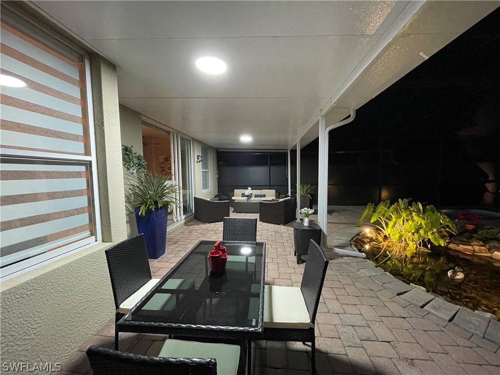 10816 Marble Brook Boulevard Lehigh Acres, FL 33936 - Photo 41 of 41 a view of a dining room with furniture