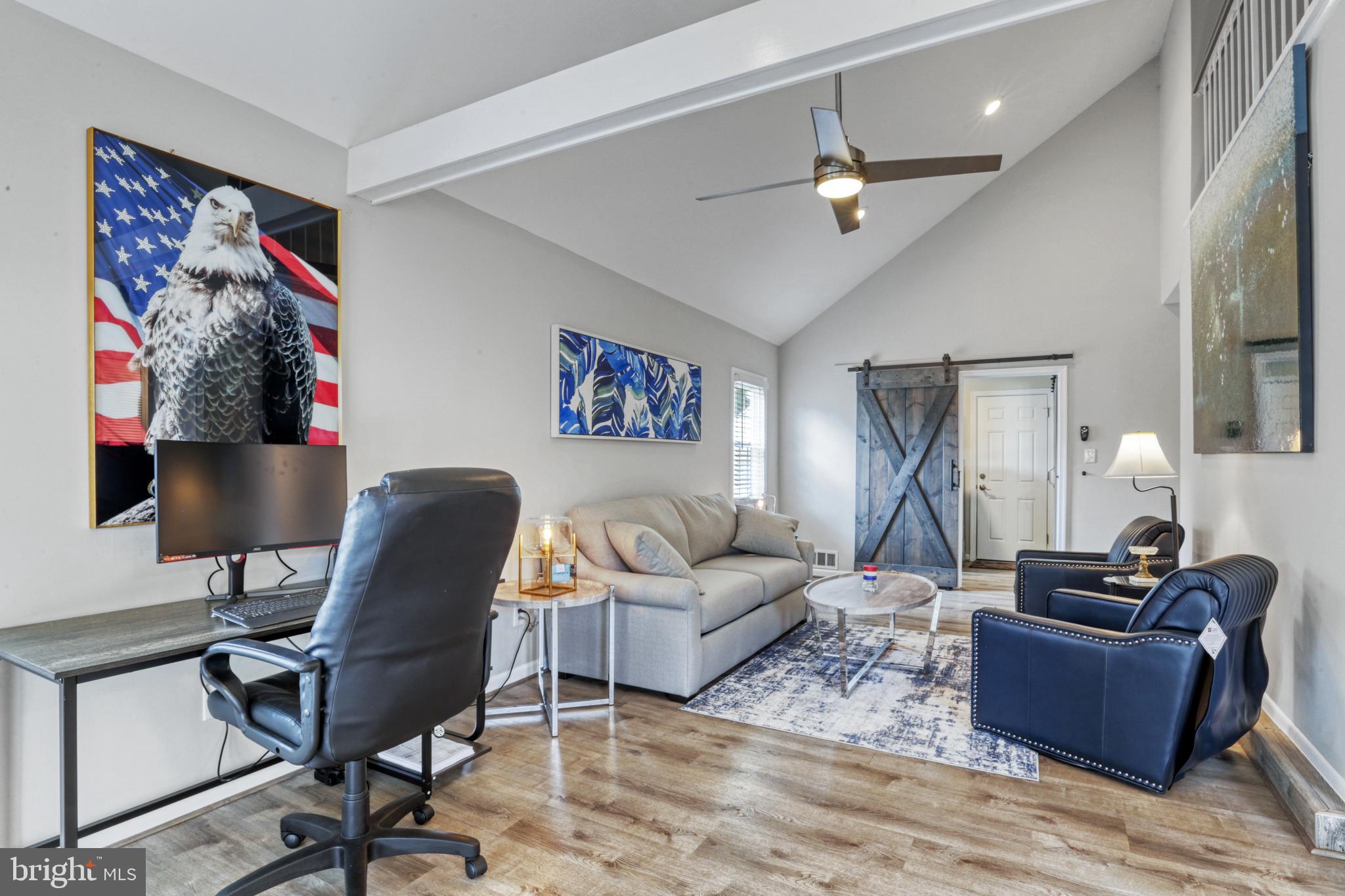 103 Cherry Tree Court Sterling, VA 20164 - Photo 12 of 32 a living room with furniture and a flat screen tv