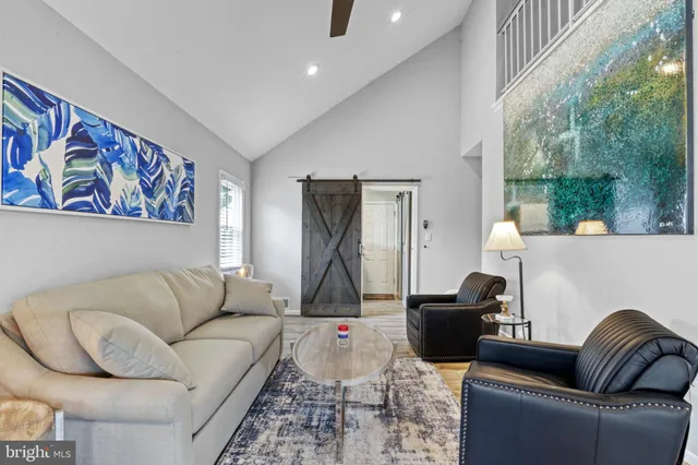 a living room with furniture and a couch