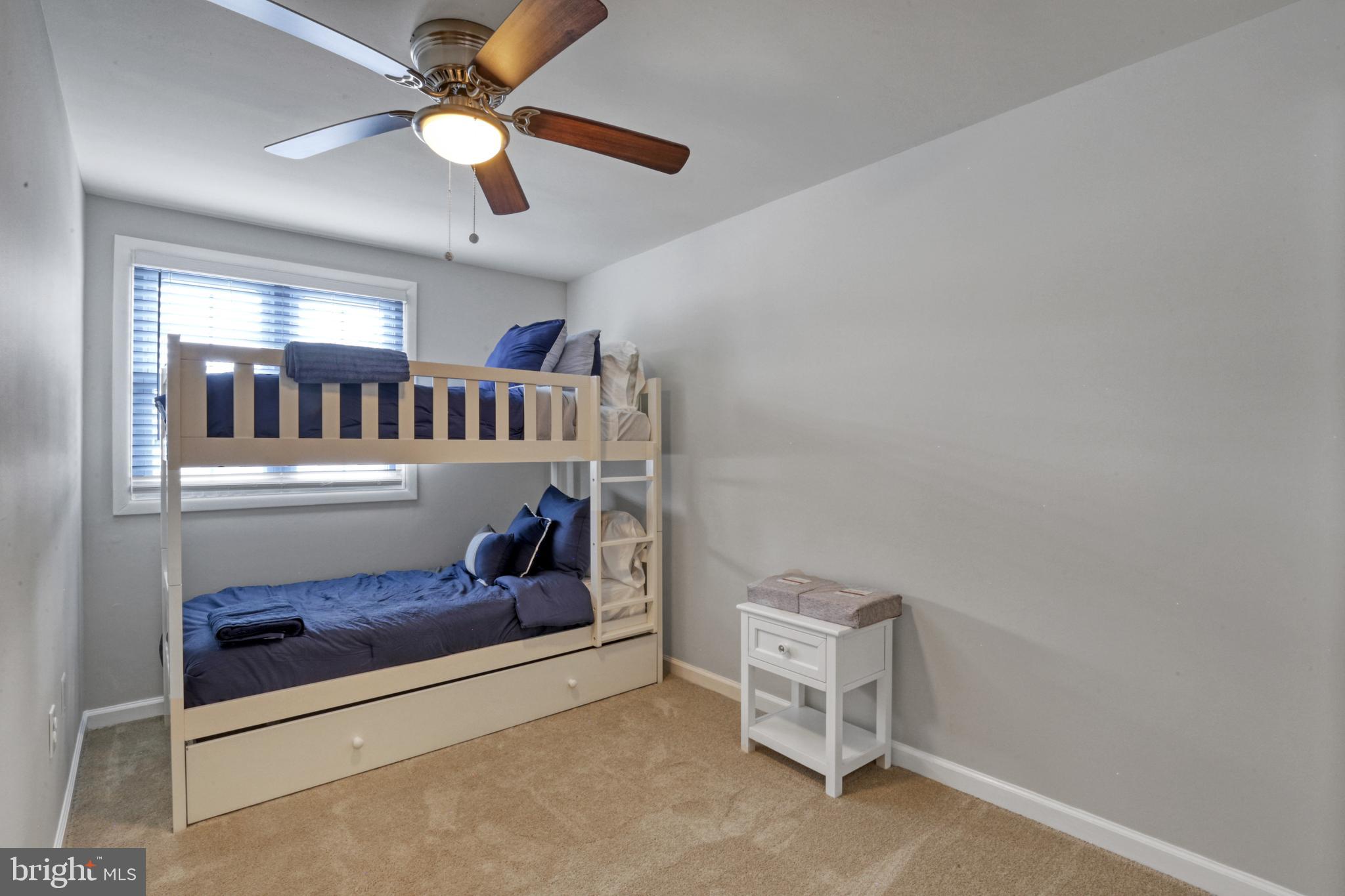 103 Cherry Tree Court Sterling, VA 20164 - Photo 19 of 32 a living room with furniture and a ceiling fan
